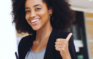 Woman giving thumbs-up